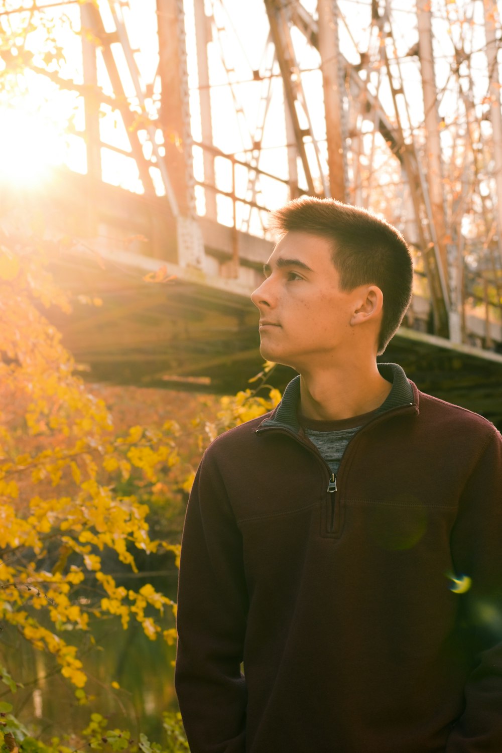 man in brown half-zip jacket