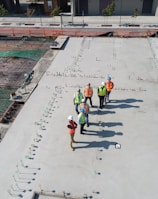 seven people standing on rooftop