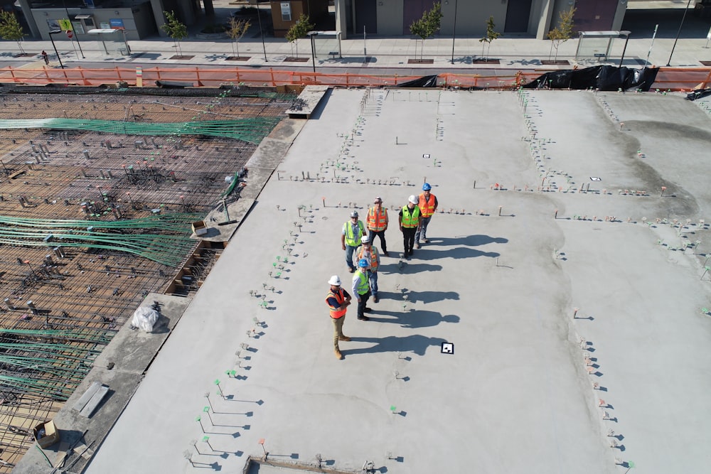 seven people standing on rooftop