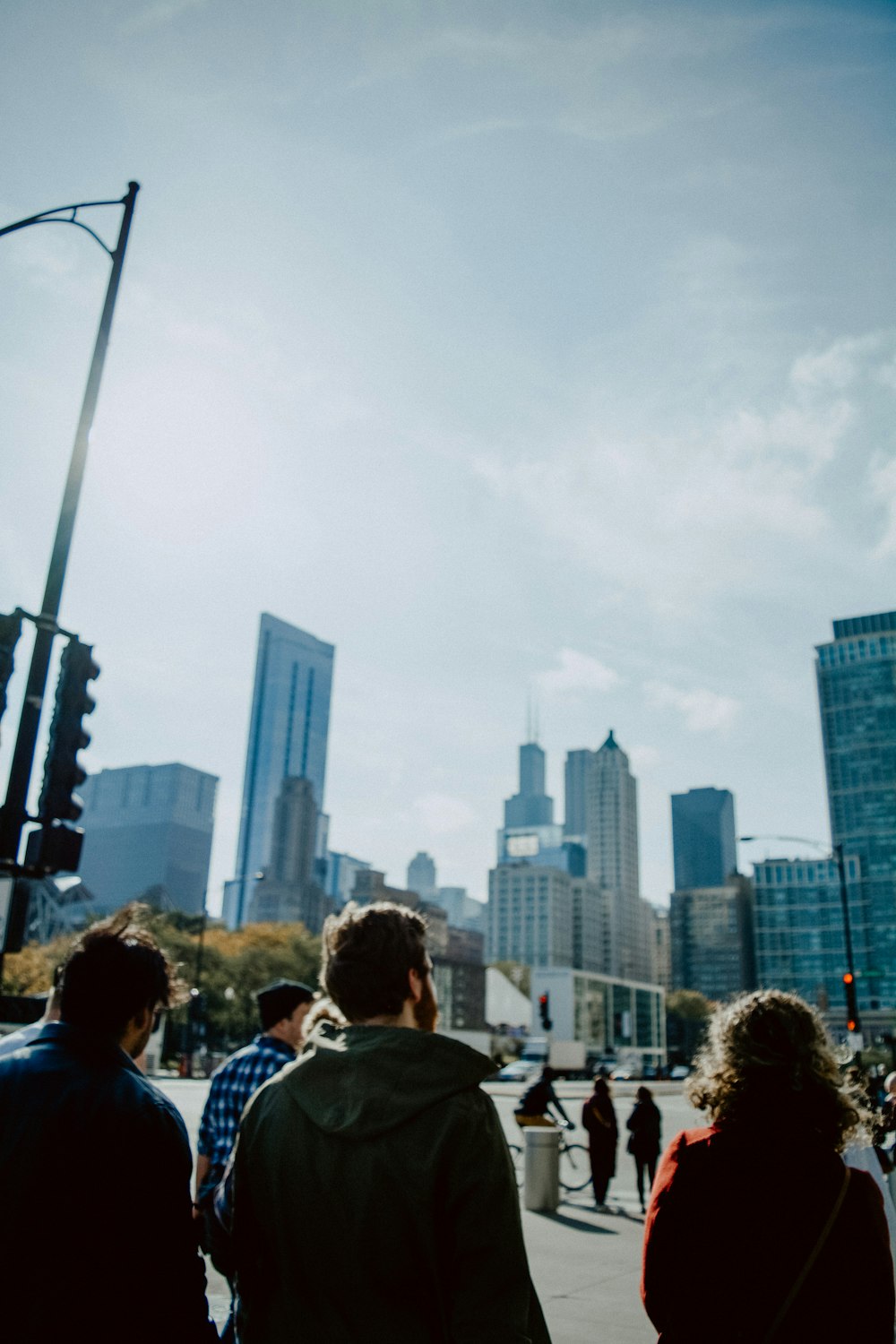 people near traffic lights