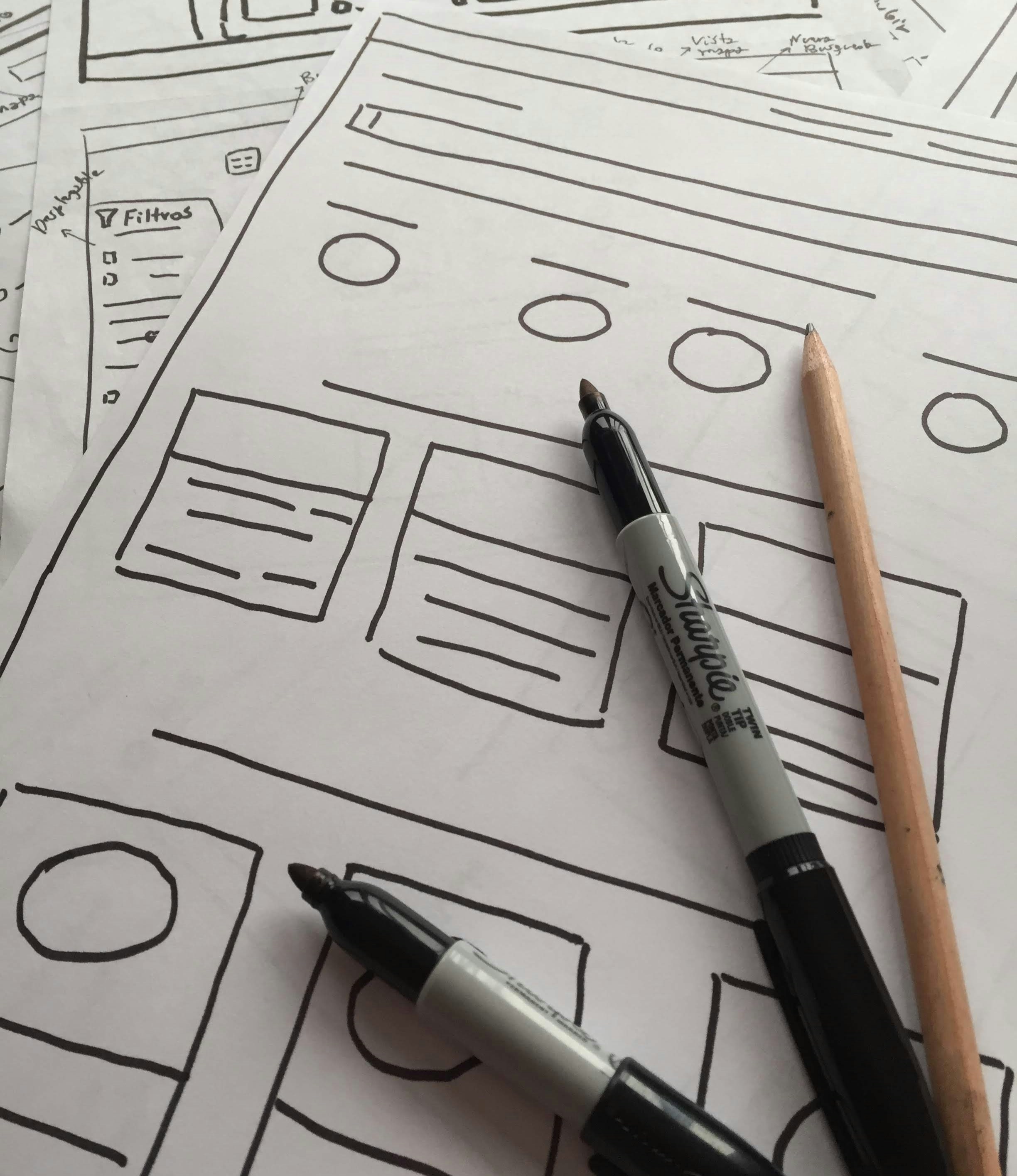 A creative workspace with notes and sketches for website optimization strategies.