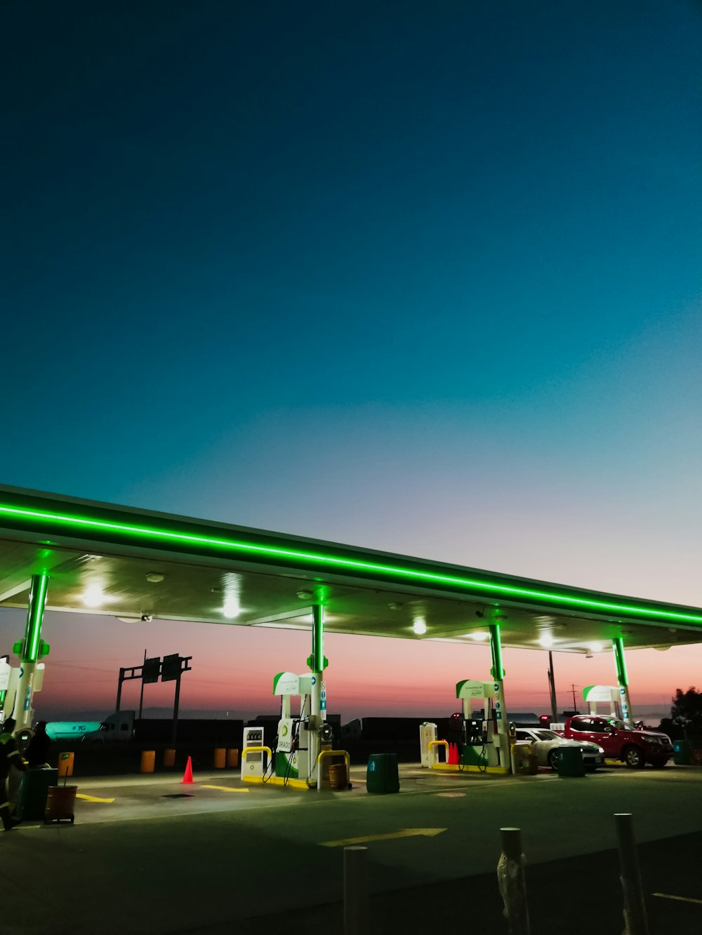 lighted gasoline station at night