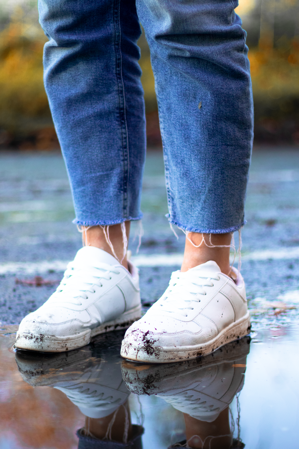 pair of white low-top sneakers