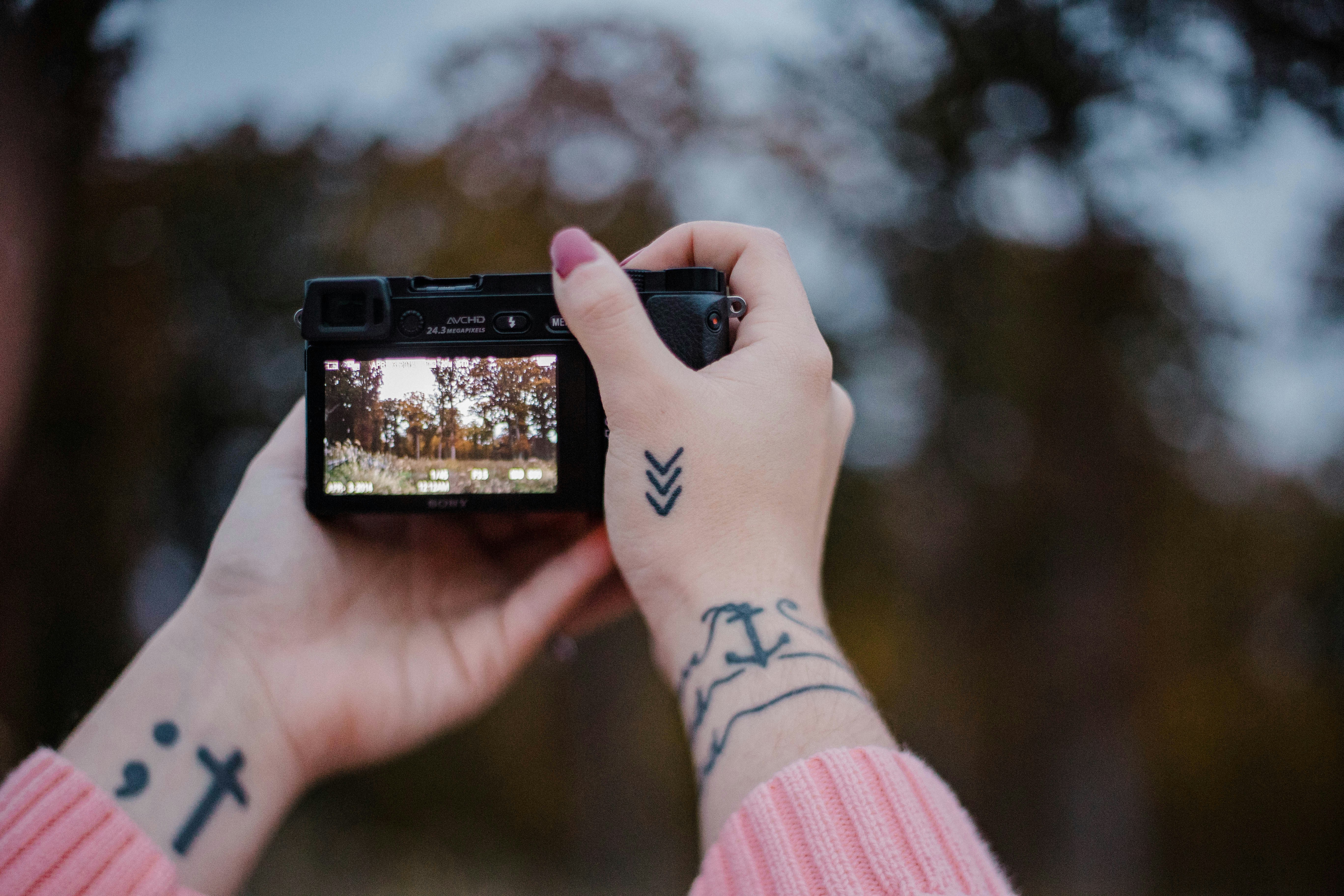 Premium Photo | Neon Design of Camera Logo With Film Reel and Tripod Warm  Yellow and Deep P Clipart Idea Tattoo