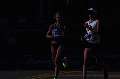 Athletes wearing smart wearable devices during a competitive race.