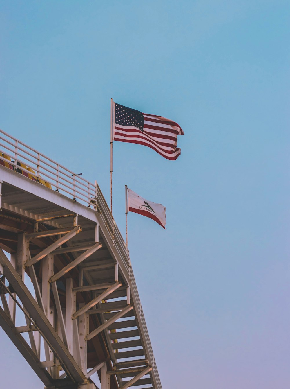 USA flag on wooden bridge