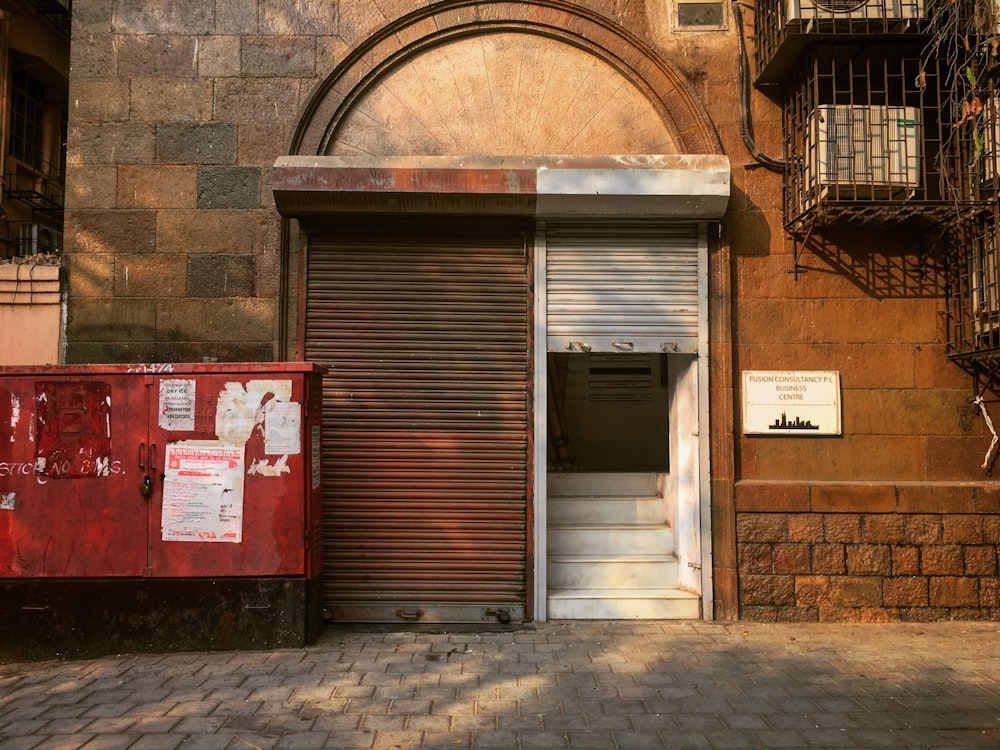 white metal roll-up door opened during daytime