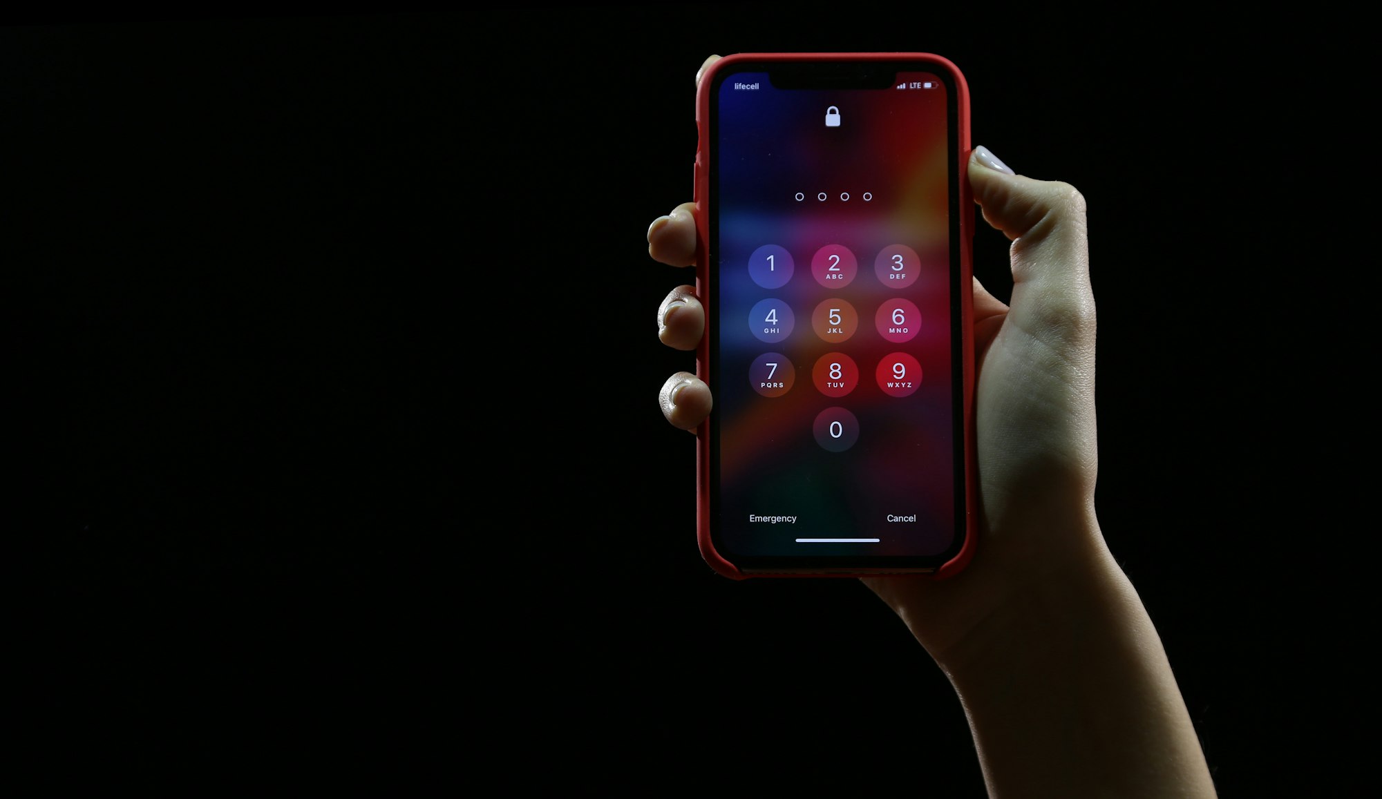 Hand with locked iPhone X