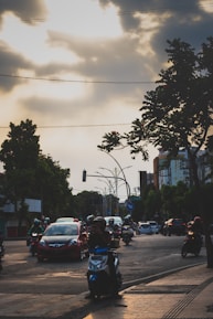 Close-up of traffic cameras capturing busy city intersections during rush hour.