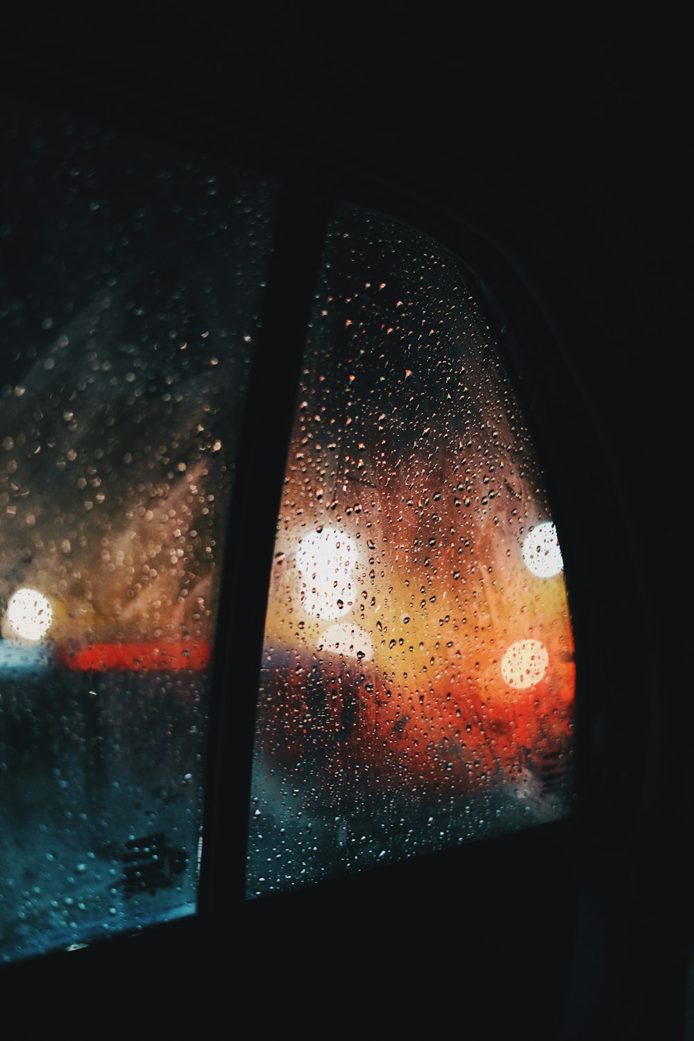 a window with rain drops on it