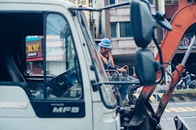 person riding excavator