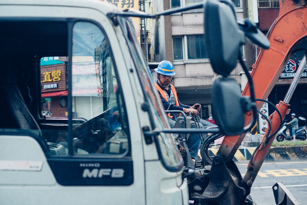 person riding excavator