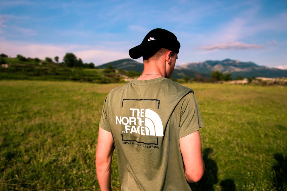 man in brown The North Face crew-neck shirt photo – Free Italy Image on  Unsplash