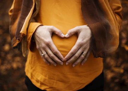 person touching stomach