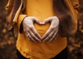 person touching stomach
