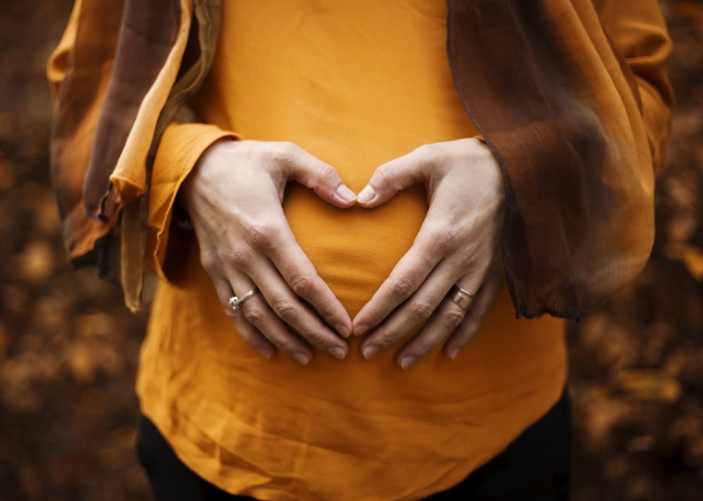 person touching stomach