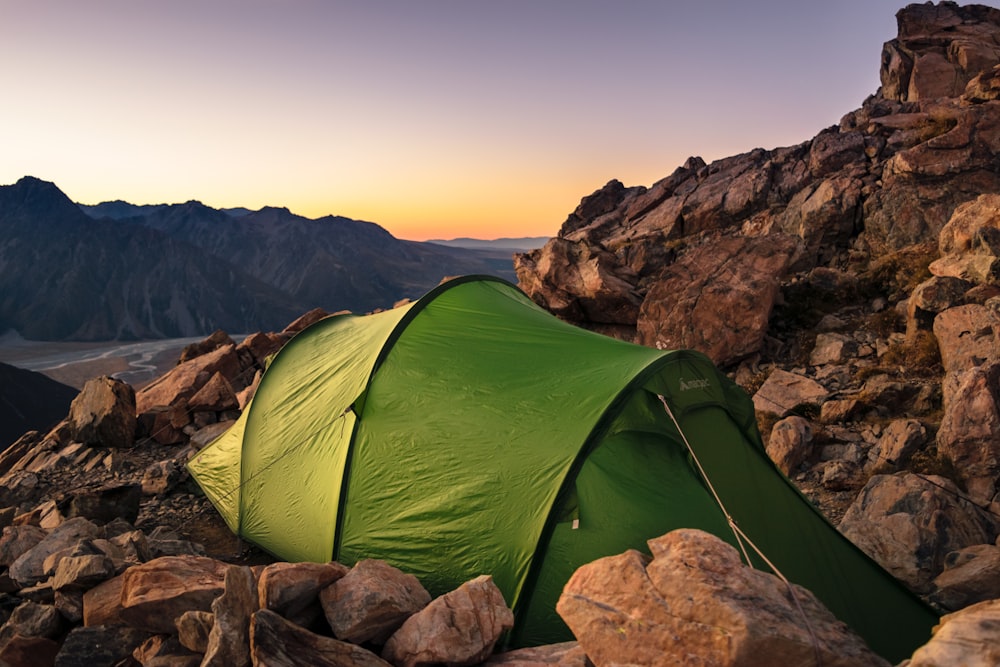 green tent on mountain