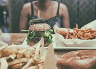 burger beside potato fries