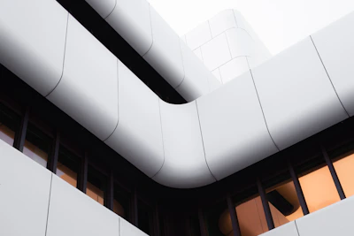 Close-up of sleek white UPVC sliding windows on a residential building
