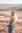 woman standing in brown field