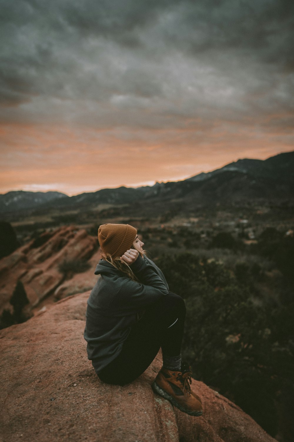 woman in green jacket