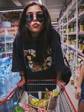 woman in black T-shirt pouting lipes
