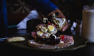 person holding piece of cake