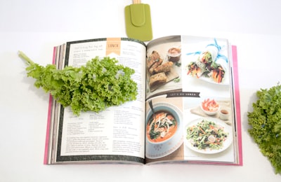 green leaf on cookbook recipe teams background