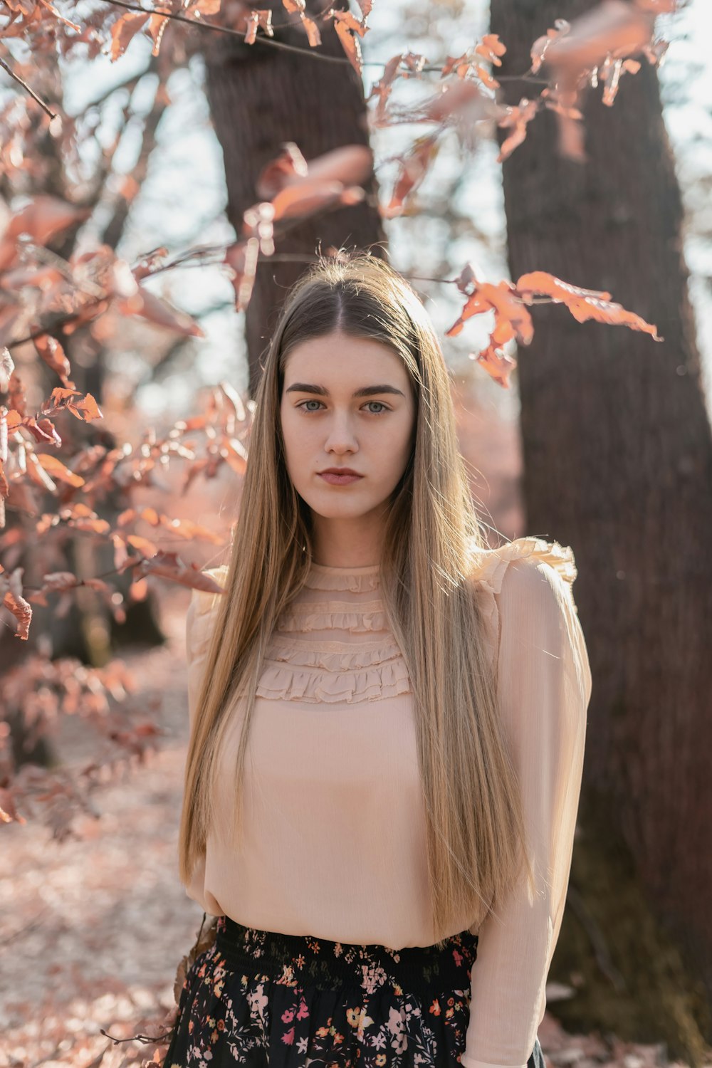 woman standing near trees