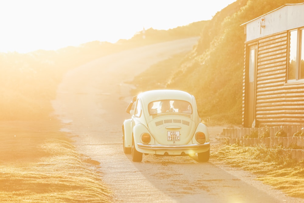 white Volkswagen Beetle