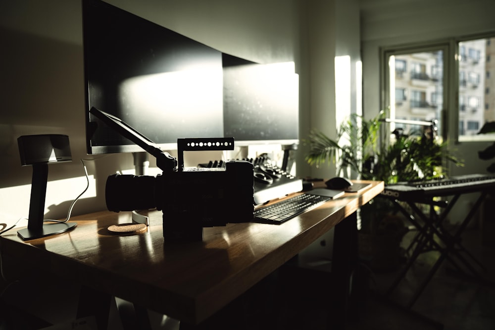 turned-off computer monitors on desk