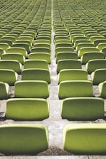 green sports field chair lot during daytime