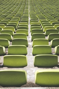 green sports field chair lot during daytime