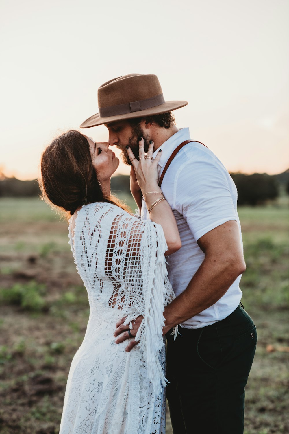 man and woman standing while facing each other