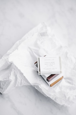 Elegant packaging of Herbal Clean soaps featuring the signature triangle design on a clean white background.