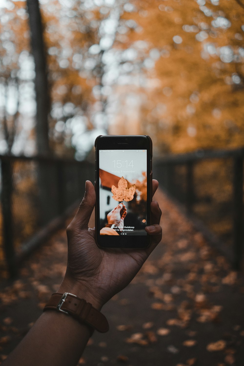 person holding black smartphone during daytime