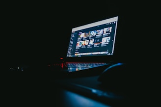 black laptop computer turned on