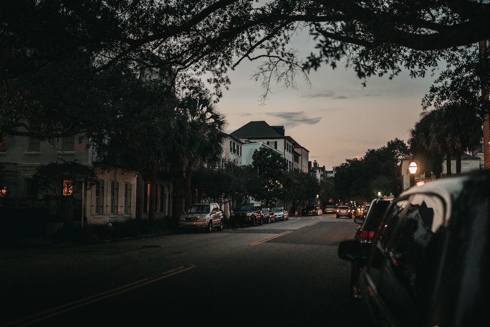 vehicles parks near road during daytime