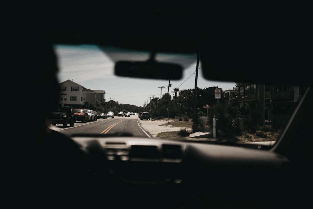 silhouette of man driving car