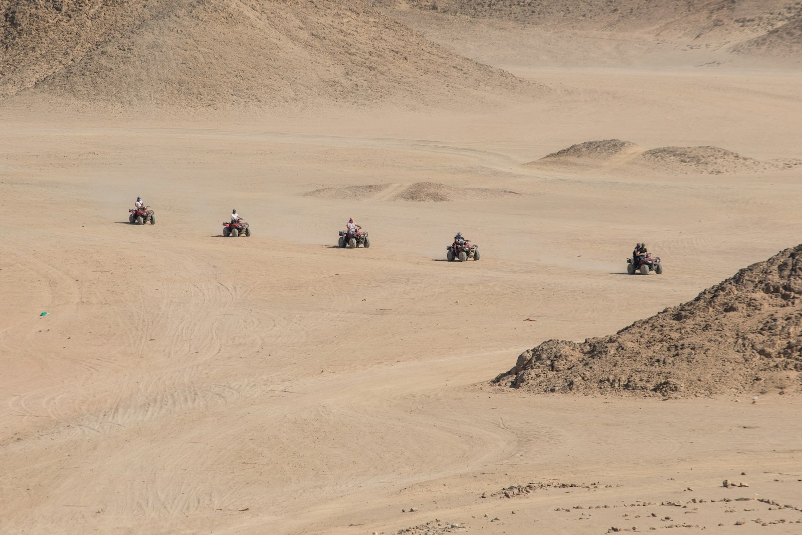 Canon EOS 7D Mark II + Canon EF-S 55-250mm F4-5.6 IS II sample photo. Five people riding atv's photography
