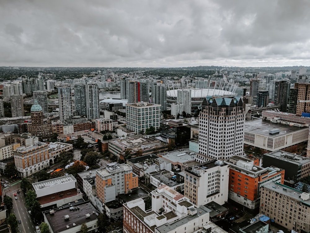 high-angle photography of buildings under grey sky