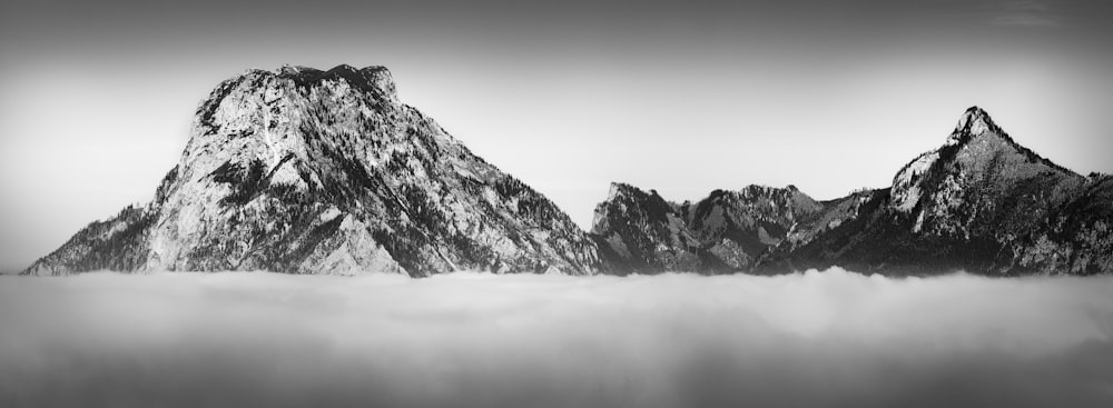 mountain range above clouds