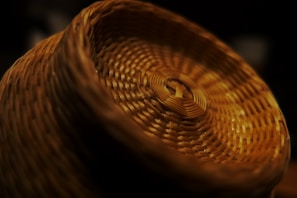 Close-up of handmade cork basket with intricate weaving patterns