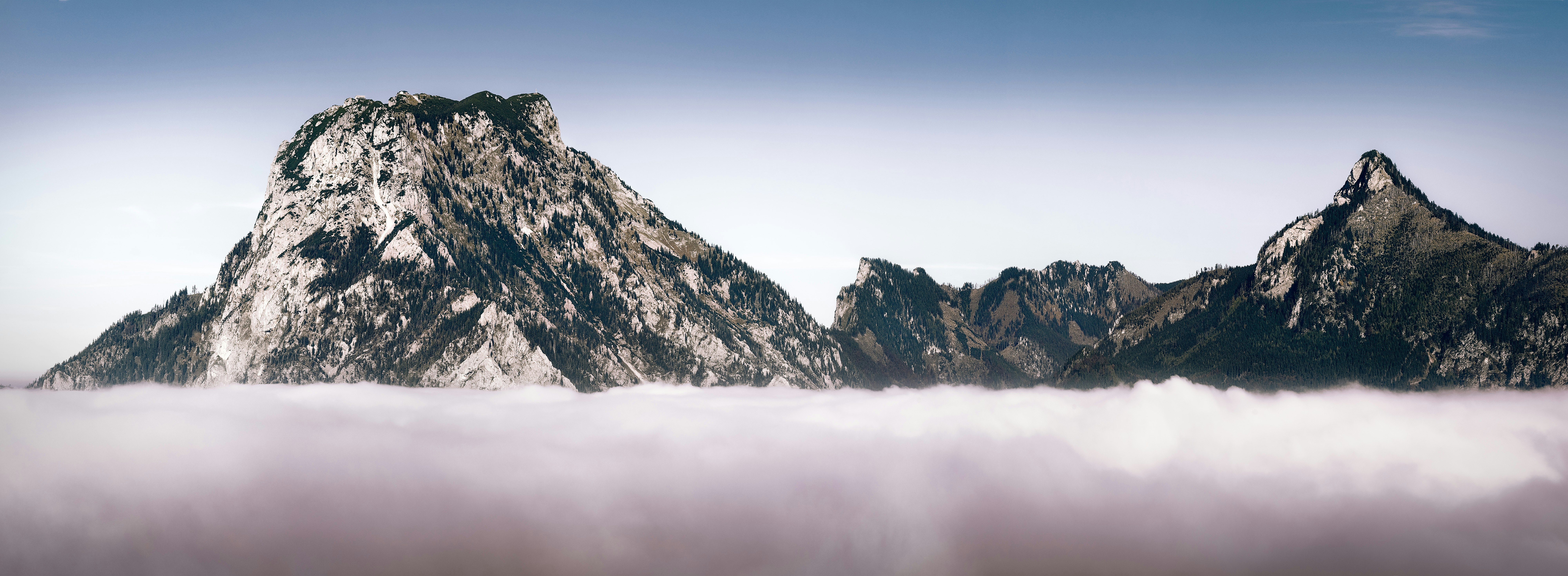 snow-covered mountain range during day