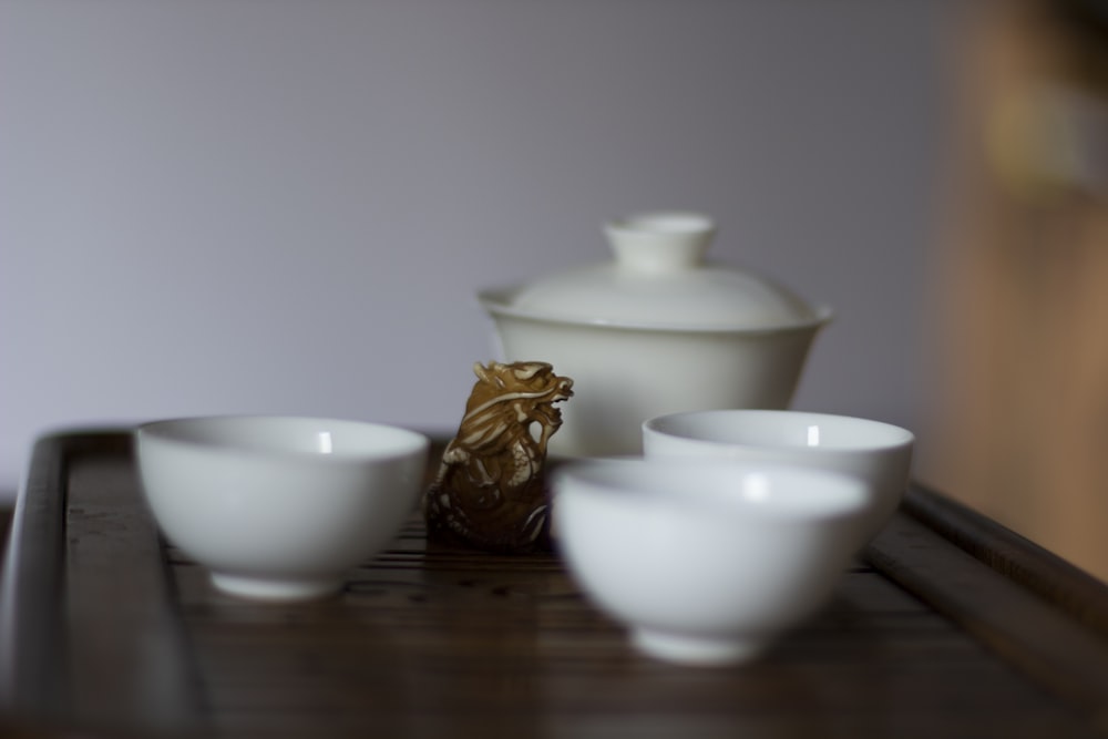 three white ceramic bowls
