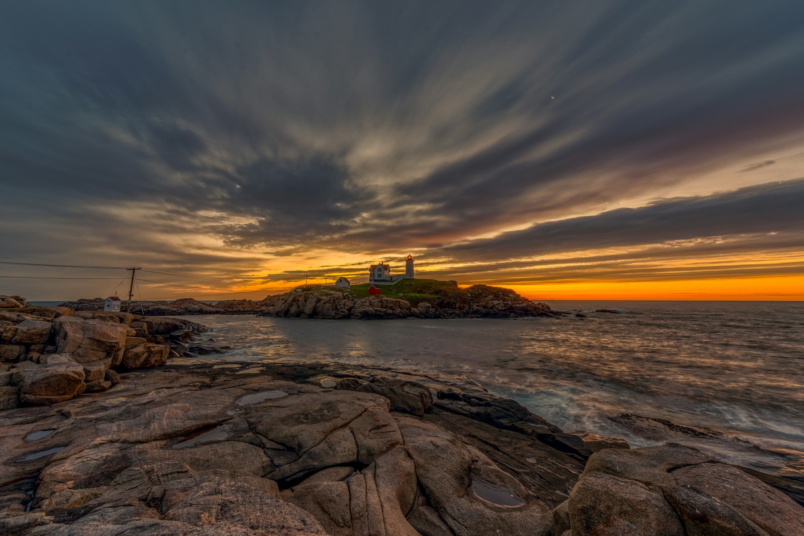 Nikon AF-S Nikkor 14-24mm F2.8G ED sample photo. Rocky shore under cloudy photography