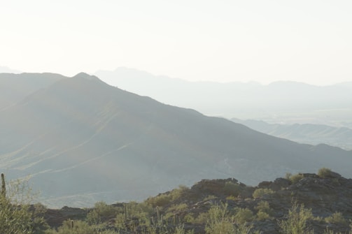 A serene view of the Arizona desert mountains at dawn, symbolizing calm and steadfastness.