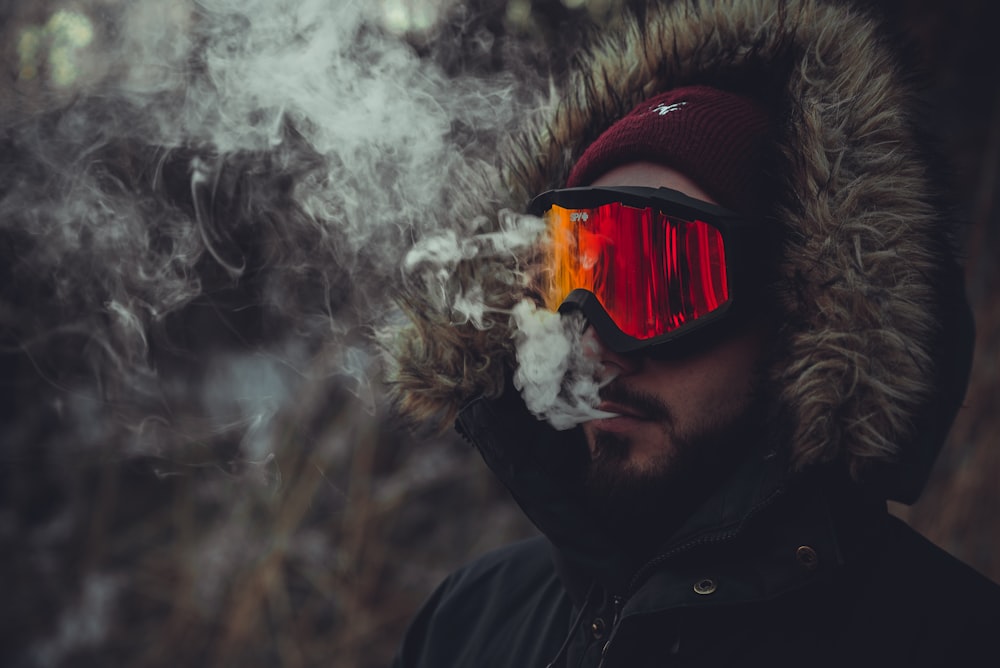 time lapse photography of man smoking