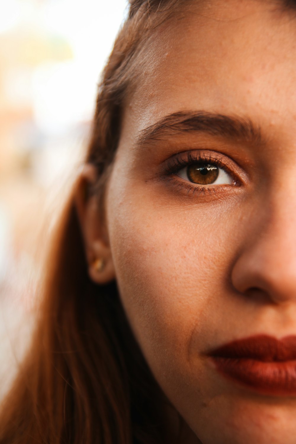 woman showing right eye