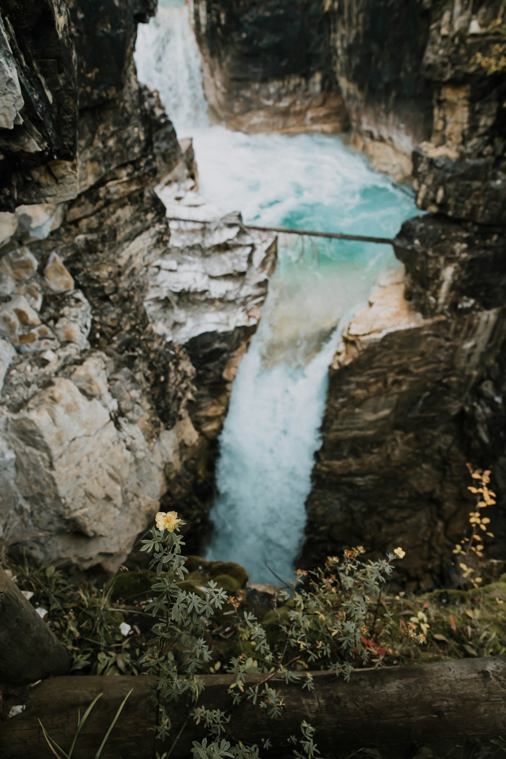 waterfall in between rock formations